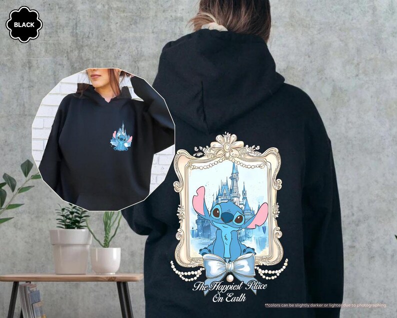 May include: Black hoodie featuring a Stitch graphic with a castle design on the back and a smaller Stitch graphic on the front. The text "The Happiest Place On Earth" is below the graphic on the back. The hoodie has a drawstring hood.