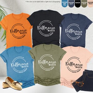 a group of women's t - shirts with different colors