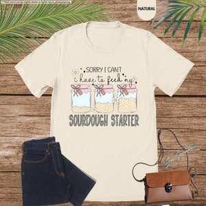 a t - shirt that says sorry i can't have to feed my sour