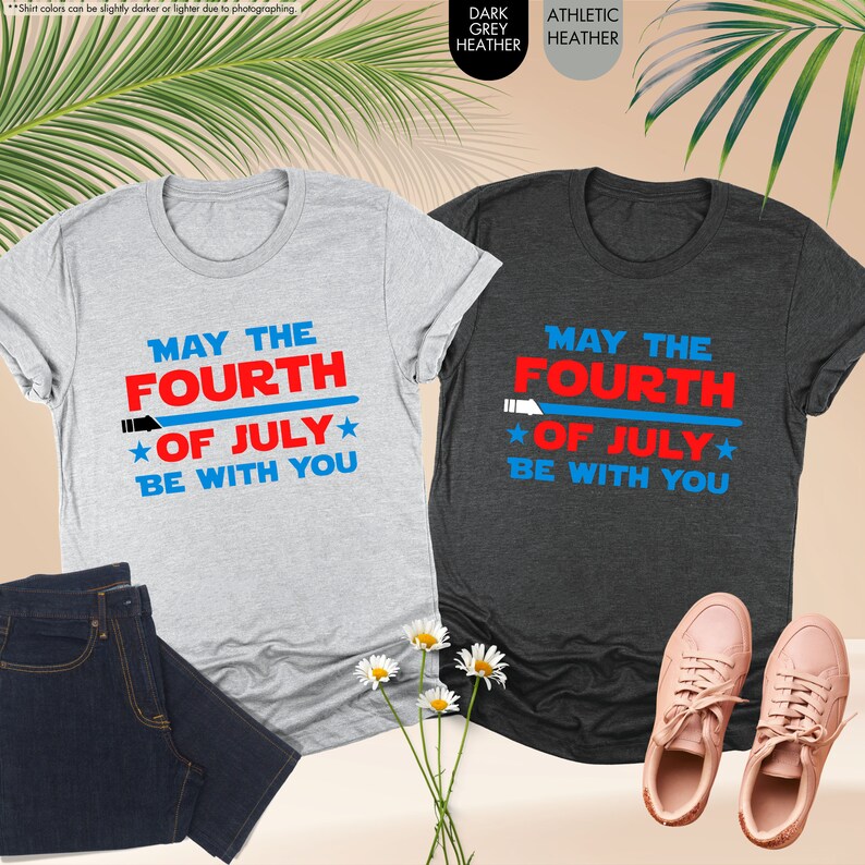 a couple of t - shirts sitting next to each other