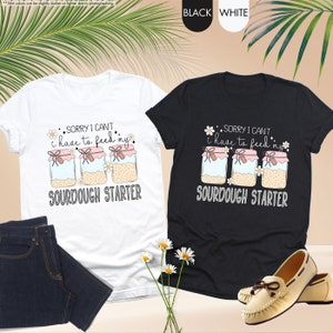 a pair of shoes and a t - shirt on a table