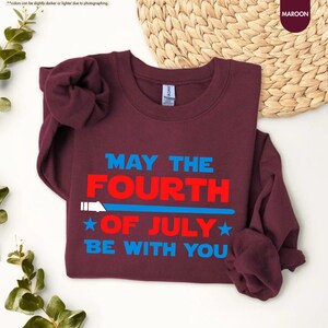 a t - shirt that says may the fourth of july be with you