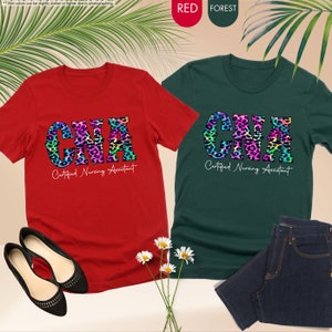 a pair of t - shirts with leopard print on them