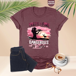 a t - shirt that says pretty in pink, with a picture of a woman