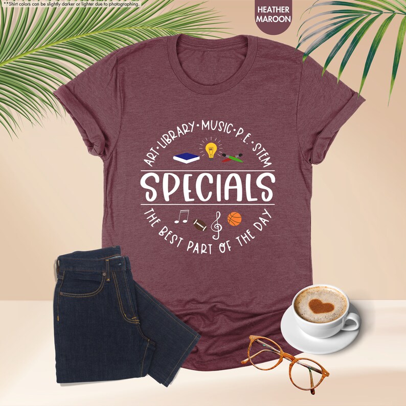 a t - shirt with the words specials on it next to a cup of coffee