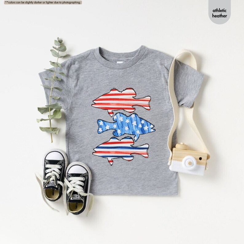 a pair of sneakers and a t - shirt on a table