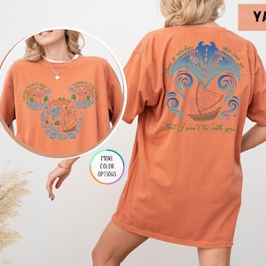 May include: Orange t-shirt with a Mickey Mouse silhouette design featuring a sailboat and the text "There is nowhere you can go that I won't be with you".