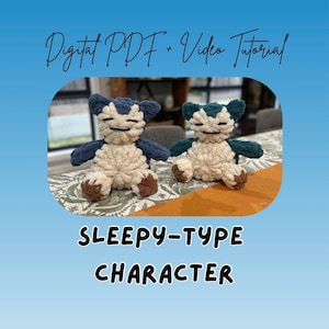 May include: Two handmade crochet plush toys featuring a sleepy-type character with dark blue and cream yarn, brown feet, and embroidered eyes. The text Digital PDF + Video Tutorial and SLEEPY-TYPE CHARACTER is displayed on a blue gradient background.
