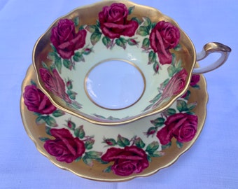 Paragon Cabbage Rose Garland Pastel yellow and Heavy 24K Gold Gild Tea Cup and Saucer