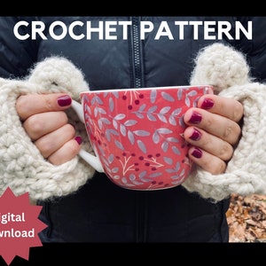 May include: A crochet pattern for a pair of cozy white fingerless gloves, perfect for keeping your hands warm while holding a mug. The pattern is available as a digital download.