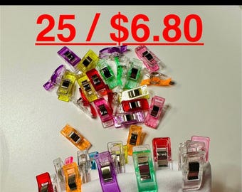 May include: A set of 25 colorful plastic clips for sewing and crafting. The clips are assorted in various colors, including red, orange, yellow, green, blue, purple, and clear. The text "25 / $6.80" is visible in the image.