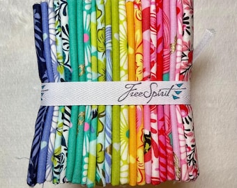 May include: A bundle of colorful fabric strips, featuring a variety of floral and abstract patterns in shades of blue, green, yellow, orange, and pink. The fabric is wrapped with a white band that reads "Free Spirit".