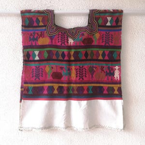 Colorful Guatemalan Vintage Huipil from Nebaj, Quiché. Traditional handmade mayan attire. Indigenous textile art.