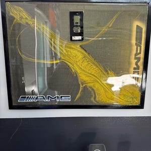 AMG Mercedes Benz BRABUS 800 G Class on gold metallic carbon fiber wall art with black frame