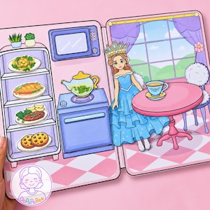 May include: A paper doll playset featuring a kitchen and dining area. The kitchen includes a refrigerator with food items, a stove, and a microwave. The dining area shows a character in a blue dress and crown sitting at a pink table with a teacup.