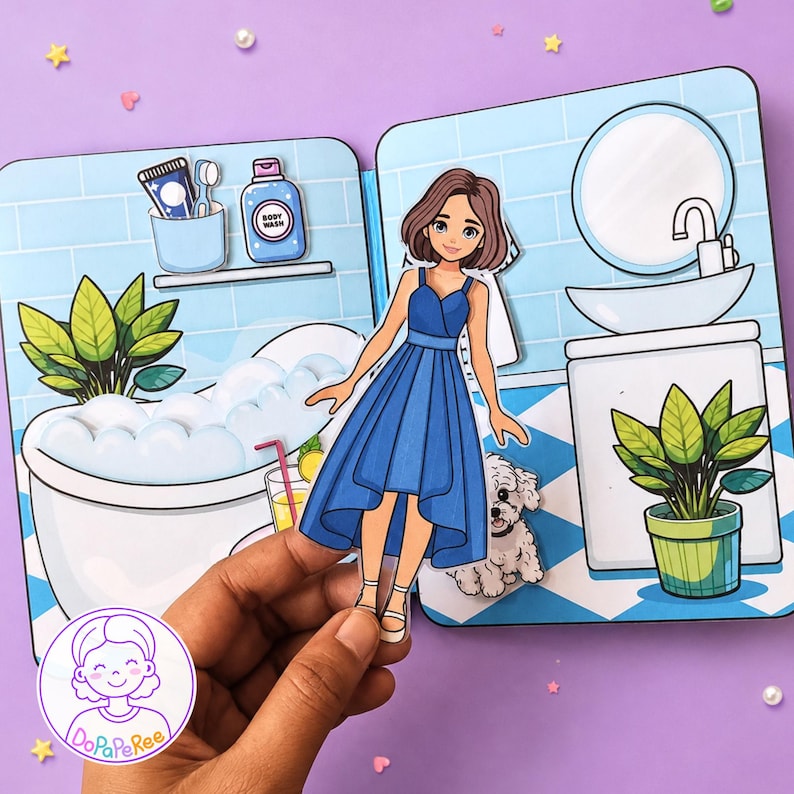 May include: A paper doll set featuring a cartoon character in a blue dress standing in a bathroom scene. The scene includes a bathtub with bubbles, a sink, a mirror, a potted plant, and a small white dog. The text DoPaPeRee is visible in a logo.
