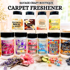 May include: Ten white plastic bottles of carpet freshener with black caps, arranged in two rows. Each bottle features a unique label with text including Savage Craft Boutique, Carpet Freshener, and scent names like Oatmeal Milk & Honey, Love Spell, and Fruit Loops.