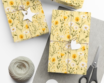Geschenkpapier mit Wildblumen und Gänseblümchen - zart geblümt auf hellgelb, ideal für fröhliche Frühlings- und Sommergeschenke