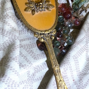 Vintage metal vanity hair brush
