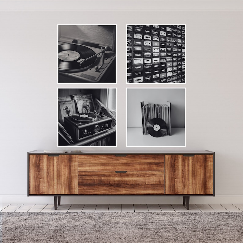 May include: A four-panel wall art set featuring black and white images of vintage audio equipment. The images include a record player, a wall of cassette tapes, and vinyl records. The art is displayed above a wooden cabinet with a dark gray top.
