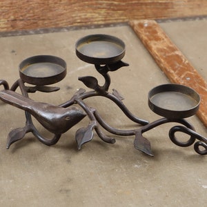 Metal candle holder for three condles with bird!