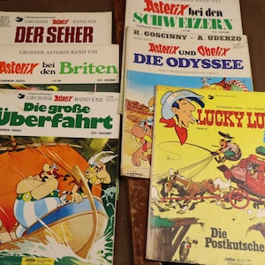 Rzadkie komiksy animowane Lucky Luke w języku niemieckim i pięć rzadkich francuskich komiksów animowanych Asterix i Obelix w języku niemieckim