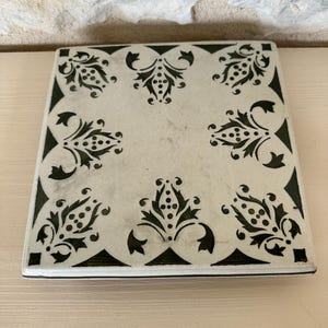Antique French Footed Terre de Fer Hot Plate