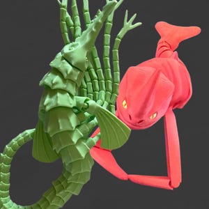 Red Bluster with yellow eyes and Brickleback Sea Beasts, Flexible Sea Monsters Fidget Toys image 1