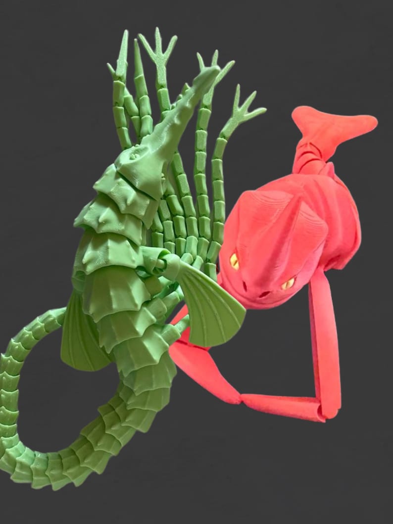 Red Bluster with yellow eyes and Brickleback Sea Beasts, Flexible Sea Monsters Fidget Toys image 1