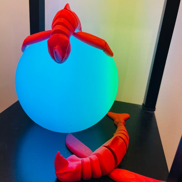 El juguete flexible Red Bluster, de la bestia marina, juguete Fidget