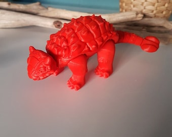 Juguete de escritorio flexible con forma de anquilosaurio