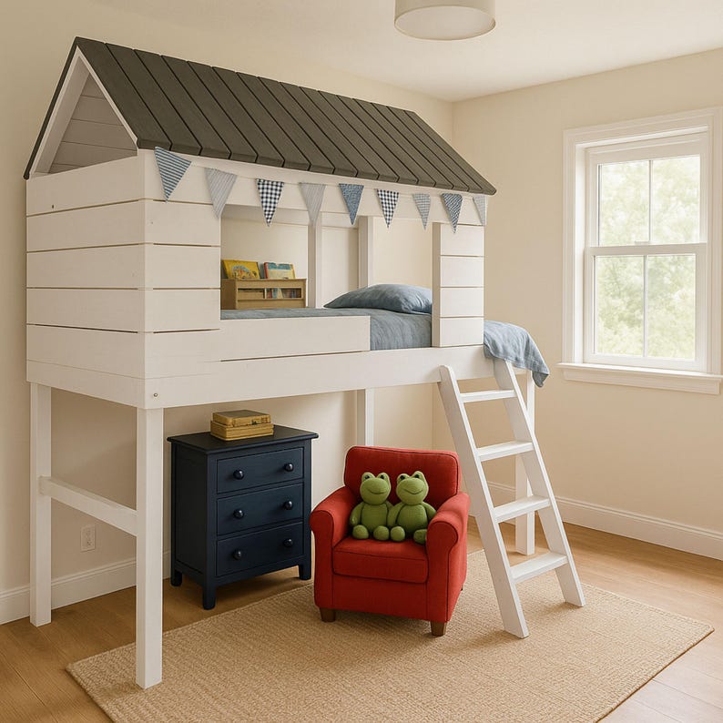 May include: A white loft bed with a house-shaped frame and a dark gray roof. The bed has a blue mattress and is decorated with blue and white pennant flags. A navy blue dresser, a red armchair, and a white ladder are also in the room.