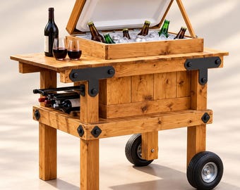 May include: A wooden outdoor beverage cooler cart featuring a hinged lid, a built-in ice chest filled with bottles, a side shelf, and a lower rack for wine bottles. The cart is constructed from light brown wood with black metal corner brackets and wheels.