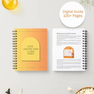 May include: A spiral-bound guide with a gradient orange cover, featuring the text "ETSY STEP BY STEP GUIDE" and "the basics." The open guide shows text and an illustration. A circular graphic reads "Digital Guide 120+ Pages."