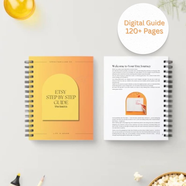 May include: A spiral-bound guide with a gradient orange cover, featuring the text "ETSY STEP BY STEP GUIDE" and "the basics." The open guide shows text and an illustration. A circular graphic reads "Digital Guide 120+ Pages."