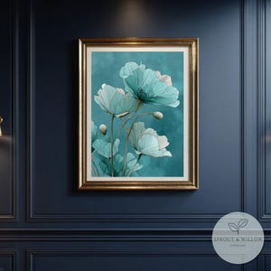 A teal botanical digital art print featuring delicate line-drawn flowers with soft, textured petals set against a smooth teal background. The artwork is displayed in a gold frame on a white paneled wall, creating a modern, elegant, nature-inspired aesthetic. Perfect for living room, bedroom, or entryway decor. Digital download floral wall art with soft teal tones and minimalistic botanical style.