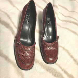 Franco Sarto red leather embossed reptile block heel with silver buckle trim.