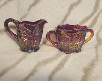 Vintage Indiana Carnival Glass Heirloom Sunset creamer and open sugar set.