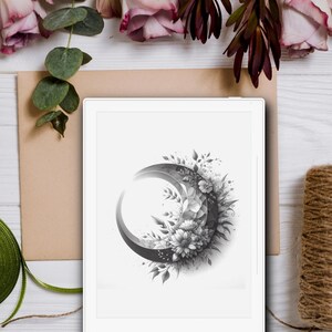 May include: A black and white illustration of a crescent moon with flowers and leaves around it.