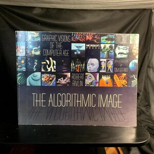 May include: A hardcover book titled "Graphic Visions of the Computer Age" by Robert Rivlin. The book cover features a collage of colorful images and the title "The Algorithmic Image". The Microsoft Press logo is visible.