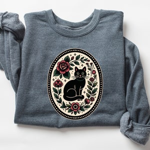 伝統的な刺繍*にインスパイアされた黒猫のスウェットシャツ、ハロウィン秋の不気味な季節のシャツ、猫好きへのギフト、彼女への魔女の女の子へのギフト