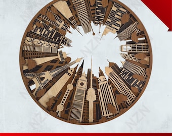 May include: A circular, multilayered wooden art piece depicting a cityscape. The design features various buildings, including skyscrapers and iconic landmarks, with a light wood and dark brown color scheme. The word "Multilayer" is in the upper right corner.