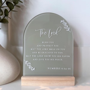 May include: A set of three ceramic mugs with a speckled, matte finish. The mugs are in shades of cream, light gray, and dark gray. Each mug has a simple, minimalist design, perfect for coffee or tea.