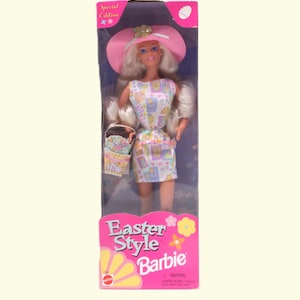 Vintage Easter Style Blond Barbie. She&#39;s dressed in an Easter dress, bonnet, shoes & ring. Easter basket and brush included. 11-1/2&quot; tall