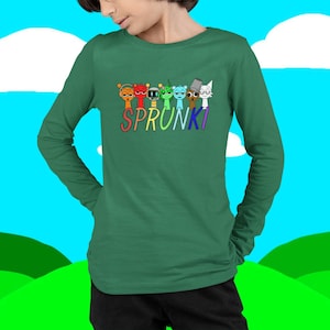Puede incluir: Camiseta verde de manga larga con un gr&aacute;fico colorido de personajes de dibujos animados y la palabra "SPRUNKI" en letras de arco&iacute;ris. La camiseta est&aacute; hecha de un material suave, adecuada para ropa casual.