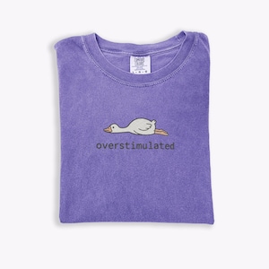 Embroidered Silly Goose Shirt Comfort Colors Overstimulated Shirt Meme Shirt Just A Silly Goose Shirt Funny overstimulated frog, overstimulated goose, overstimulated shirt, silly goose shirt, funny humor shirt, sarcasm shirt, funny goose shirt, got too silly shirt, funny goose gift, embroidered goose, silly goose meme, funny meme shirt, silly goose crewneck
