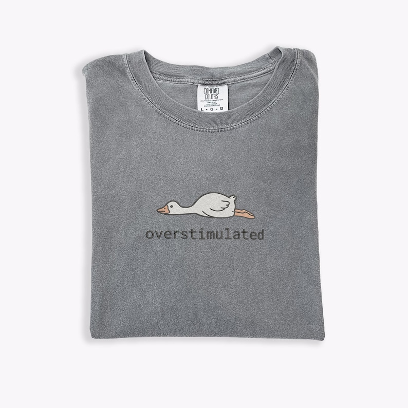 Embroidered Silly Goose Shirt Comfort Colors Overstimulated Shirt Meme Shirt Just A Silly Goose Shirt Funny overstimulated frog, overstimulated goose, overstimulated shirt, silly goose shirt, funny humor shirt, sarcasm shirt, funny goose shirt, got too silly shirt, funny goose gift, embroidered goose, silly goose meme, funny meme shirt, silly goose crewneck