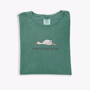 Embroidered Silly Goose Shirt Comfort Colors Overstimulated Shirt Meme Shirt Just A Silly Goose Shirt Funny overstimulated frog, overstimulated goose, overstimulated shirt, silly goose shirt, funny humor shirt, sarcasm shirt, funny goose shirt, got too silly shirt, funny goose gift, embroidered goose, silly goose meme, funny meme shirt, silly goose crewneck