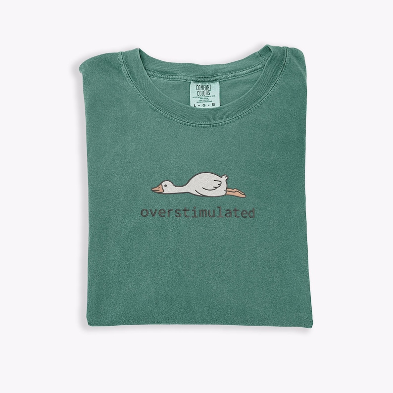 Embroidered Silly Goose Shirt Comfort Colors Overstimulated Shirt Meme Shirt Just A Silly Goose Shirt Funny overstimulated frog, overstimulated goose, overstimulated shirt, silly goose shirt, funny humor shirt, sarcasm shirt, funny goose shirt, got too silly shirt, funny goose gift, embroidered goose, silly goose meme, funny meme shirt, silly goose crewneck