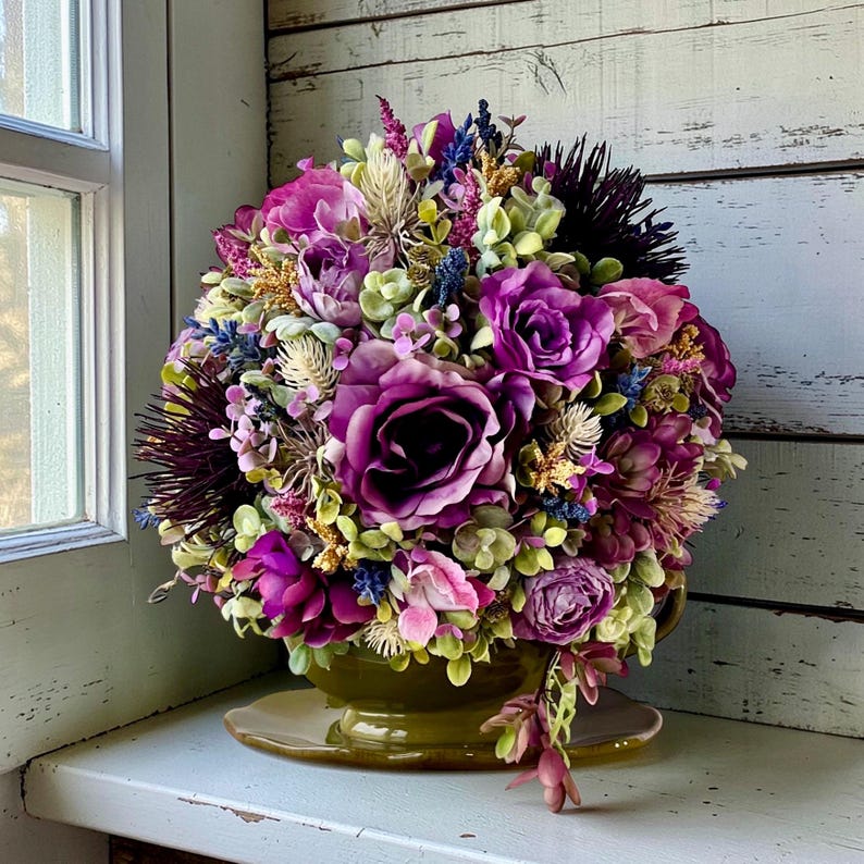 Vintage gravy boat centerpiece with lush purple florals, English cottage home decor, grandmillennial styling, romantic botanical arrangement, spring summer farmhouse decor